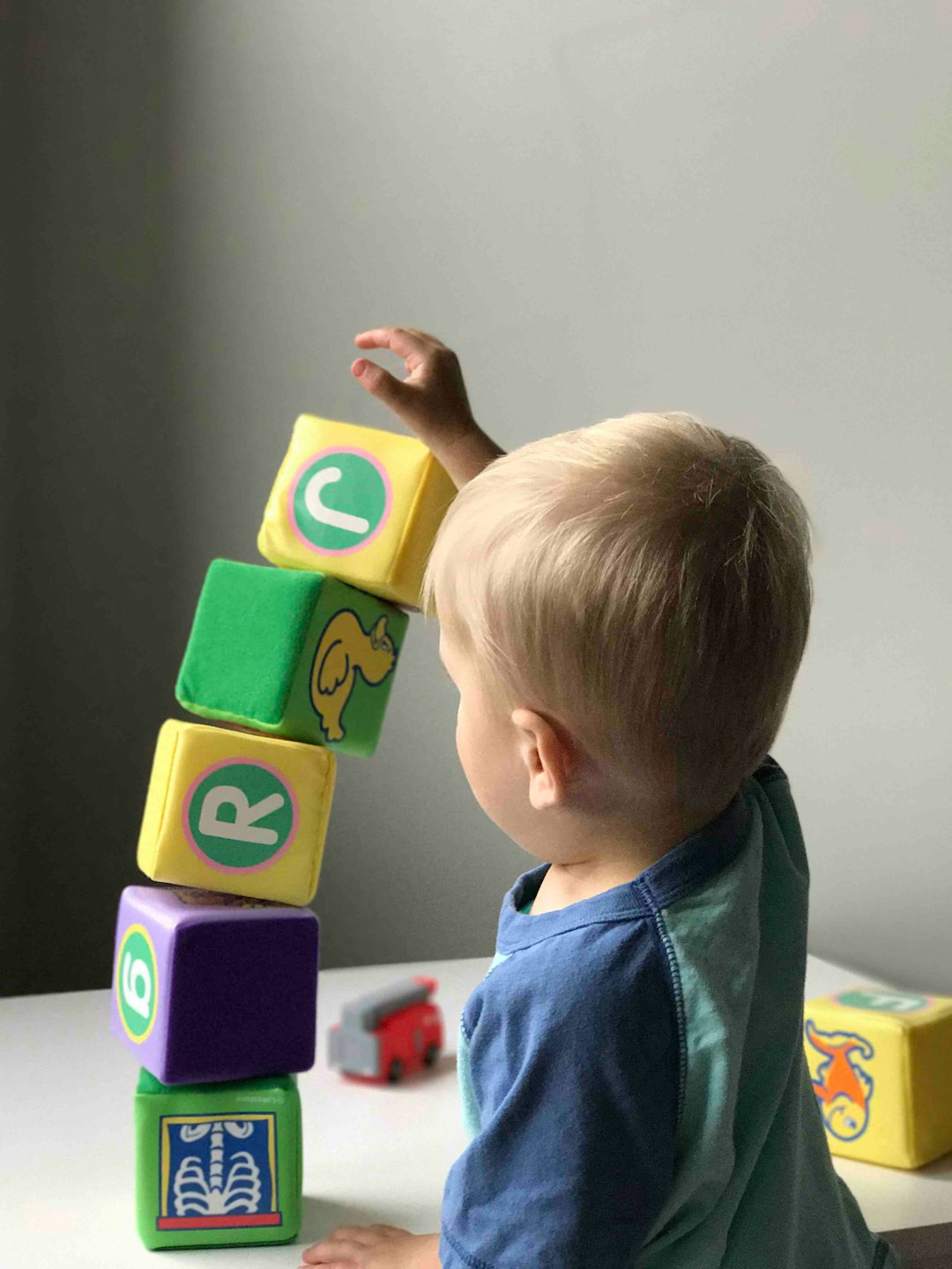 The Art of Drawing Readers In: Your attractive post title goes here Baby building stack of blocks